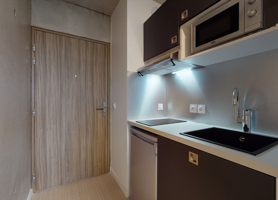 Coin cuisine moderne d’un studio étudiant Artemisia à Montpellier.